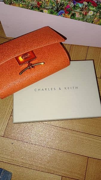 Charles and Keith huxley metallic-accent front flap wallet - orange 2