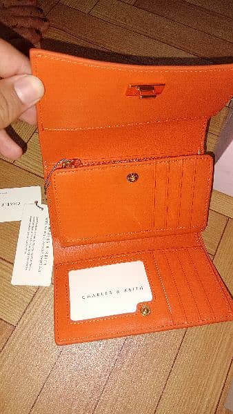 Charles and Keith huxley metallic-accent front flap wallet - orange 3