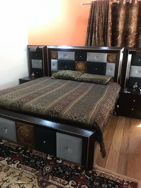wooden double bed with side tables and spring mattress 3