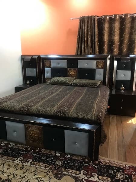 wooden double bed with side tables and spring mattress 4