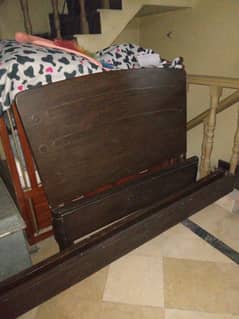 Single wooden bed + side table