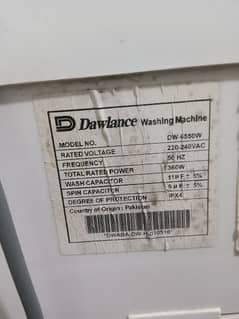 white dawalance washing machine
