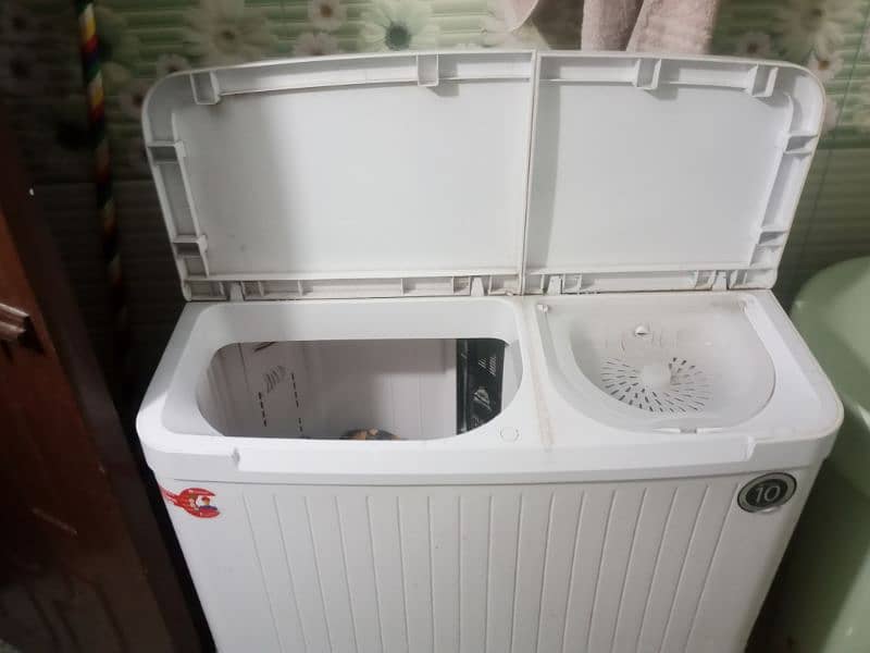white dawalance washing machine 4