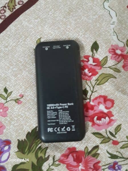 10000mhA power bank ;Branded Just once used ,under wareenty 3