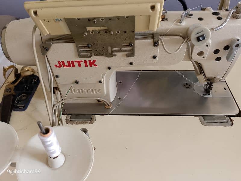 juitik sewing machine.  auto cutter and condition 9/10 1