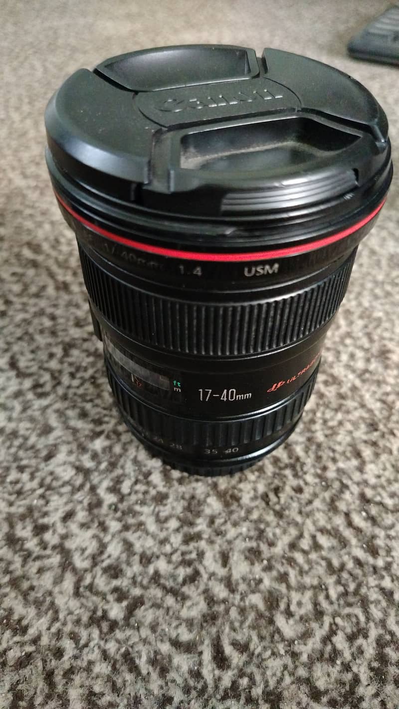 Canon 17/40 F4 . . 8/10 Forse I need some money . . work 100)100 ef lans 7