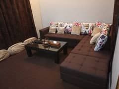 7 seater L shaped sofa with cushions. and swing