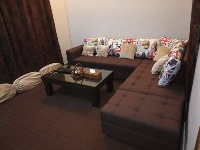 7 seater L shaped sofa with cushions. and swing 1