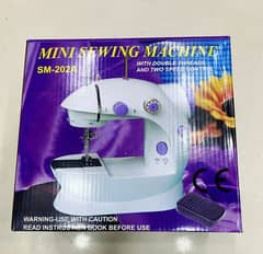 Mini sewing machine 0