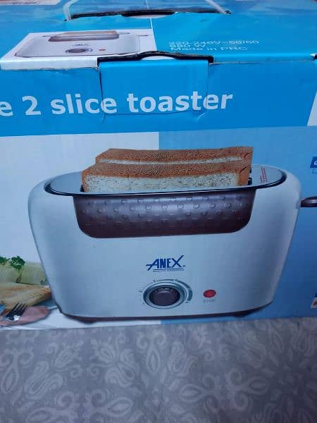 Deluxe tow slice toaster 1