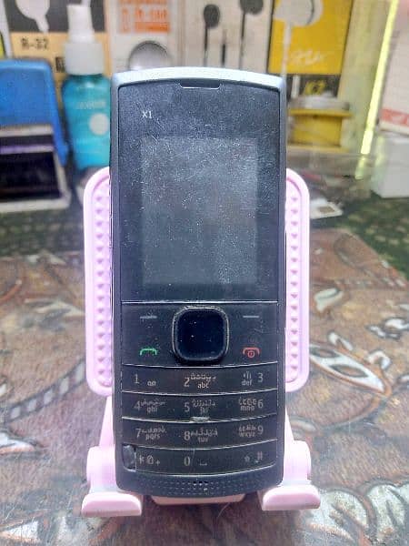 Nokia 215 ok phon ha pta bhi ok ha awr bhi aol . adal mli jy gy a 1