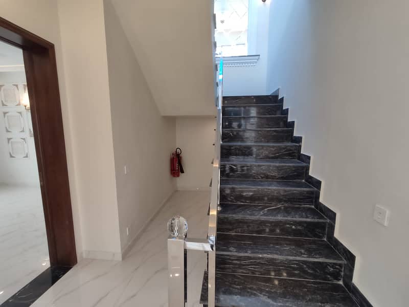 10 Marla slightly used house available for rent in the prime location of DHA Phase 6. 4
