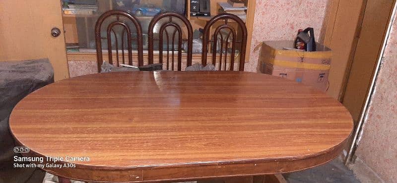wooden dining table with six chairs in excellent condition 1