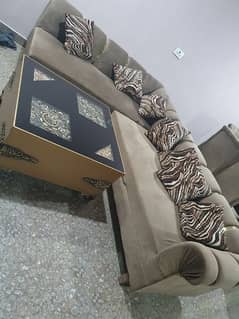 L shapy sofa with coffee table