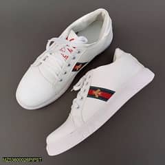 white sport shoes 0
