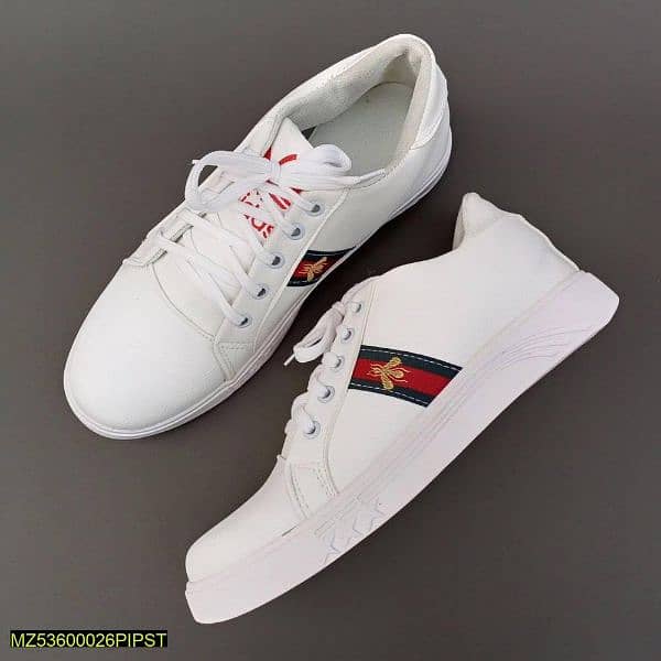 white sport shoes 0