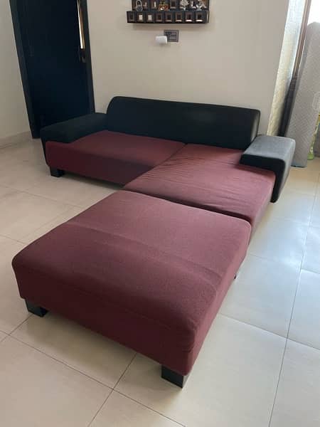 L shaped sofa habbit red and black 1