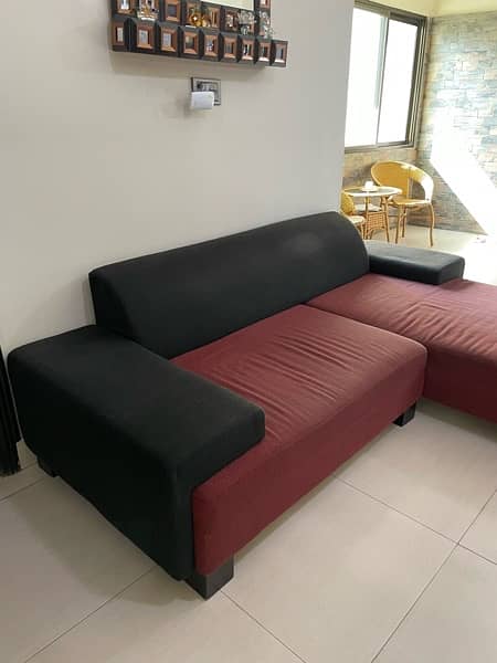 L shaped sofa habbit red and black 2