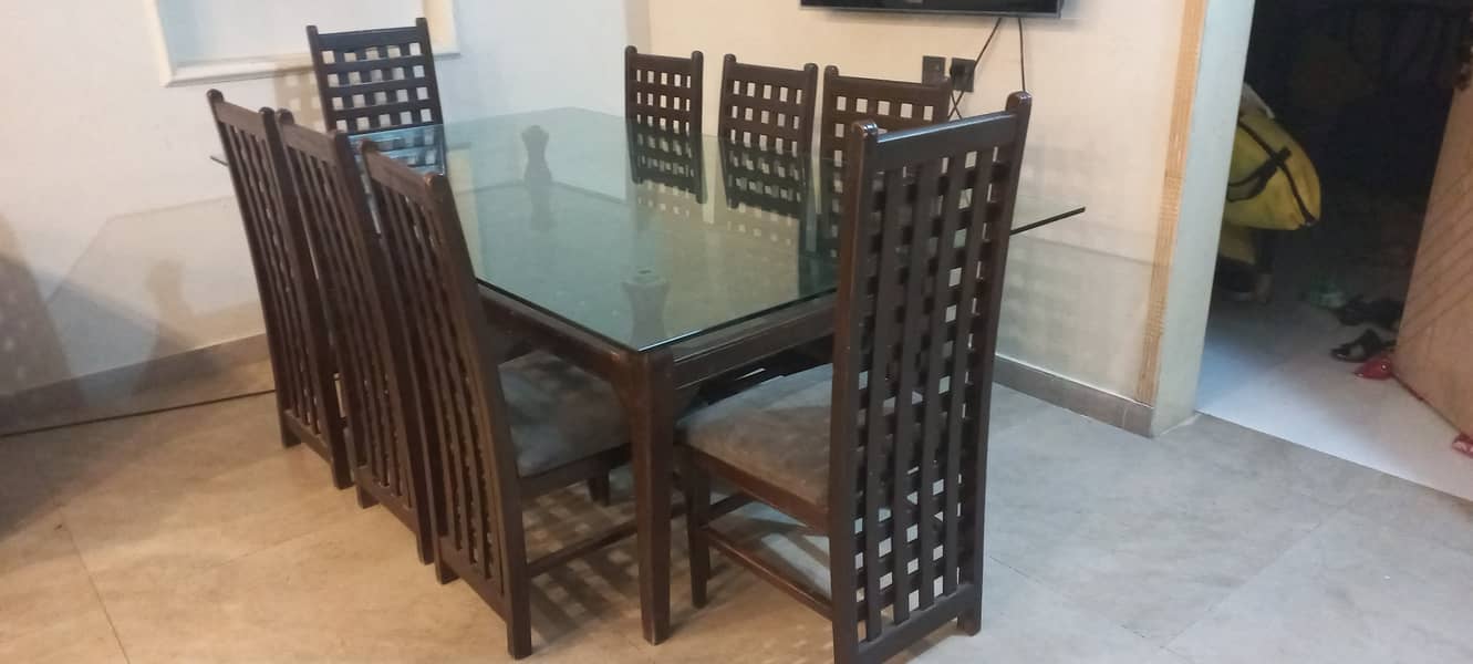 8 seater dinning table solid wood thick glass top 1