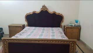 Brand new wooden queen sized bed with soft patting on the back