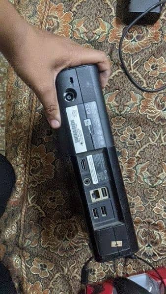 this console Xbox 360e model with wireless controller 1