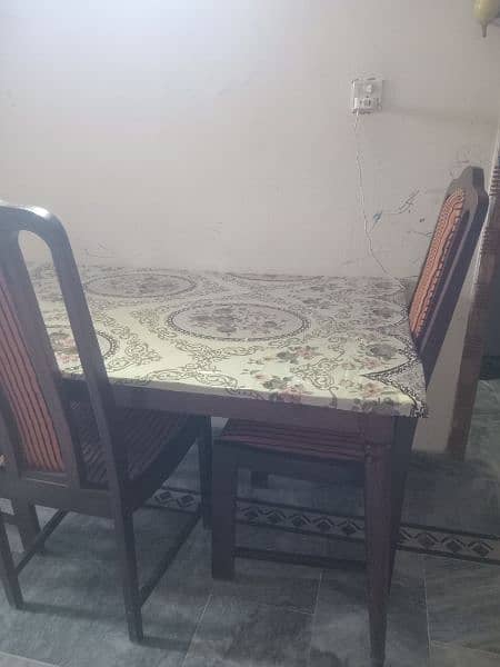 woden daing table with 3 chairs 3