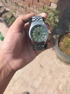 Seiko 5 green military dial watch