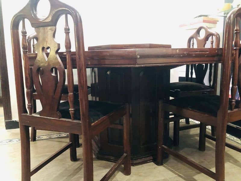 Dinning table with four chair extra chairs also available 2