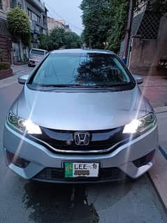 Honda Fit 2014. Hybrid  First Owner. on my Name