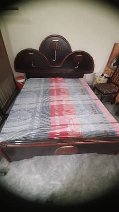 Elegent Wooden bed in good condition