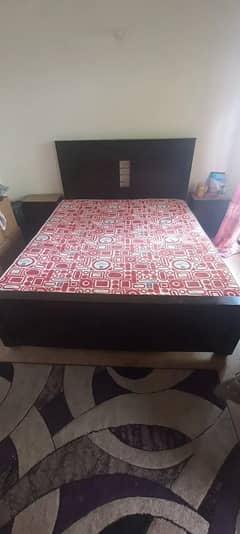 double bed with master molty mattress and two side tables