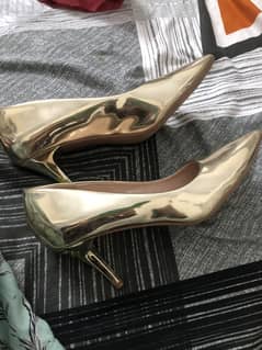 Golden metallic heels