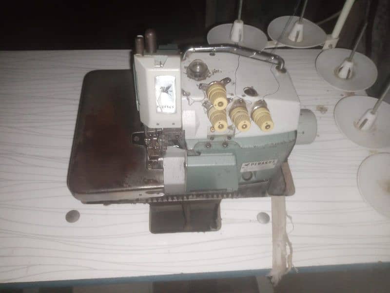 4 machine sewing.   2 juki senger and 2 safte 4 thread sarwo 3