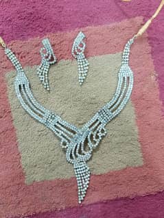 silver necklace with earrings