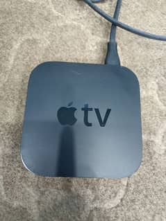 apple TV box and 90W power supply