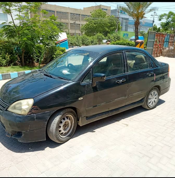 Want to sell company maintained suzuki Liana with new tyers 2006 3