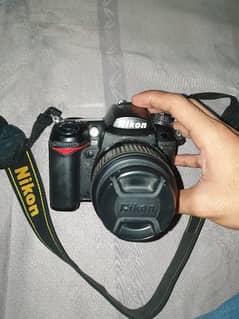 Nikon D7000 DSLR CAMERA With Lens. New Condition 0