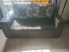 7 seater black sofa with cushions 0