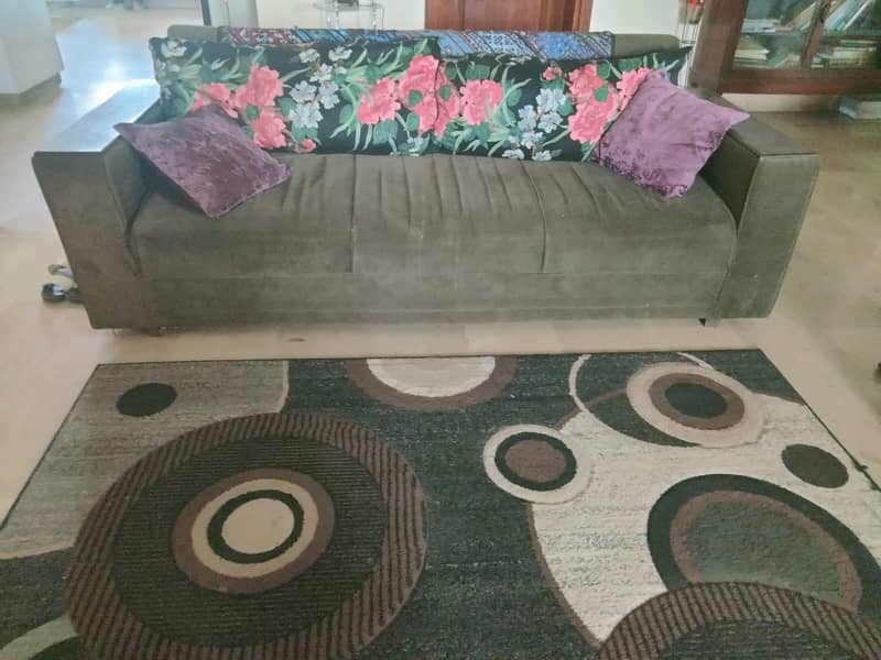 7 seater black sofa with cushions 2
