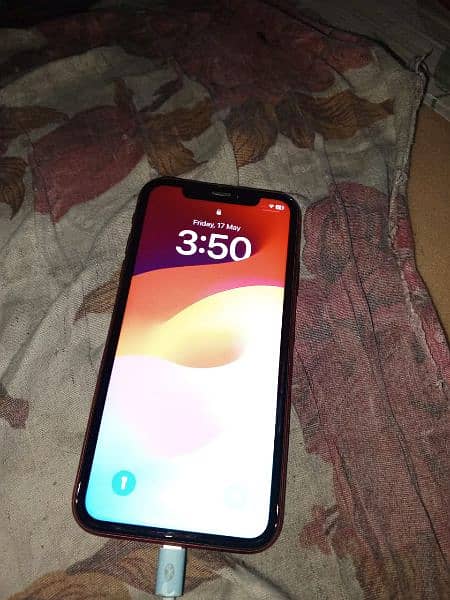 iPhone xr  factory unlock 10 by 10 condition 64 GB water pack 1