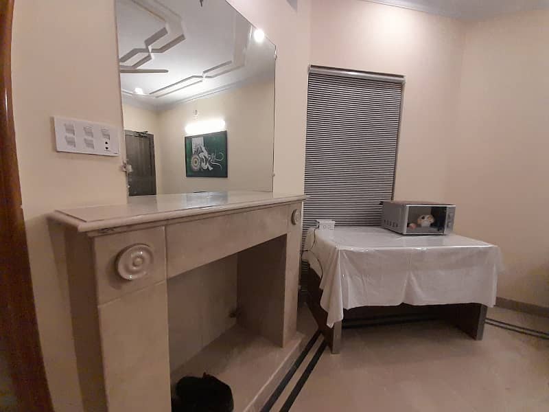 Fully furnished master bedroom with bath available for rent in dha phase 4. 1