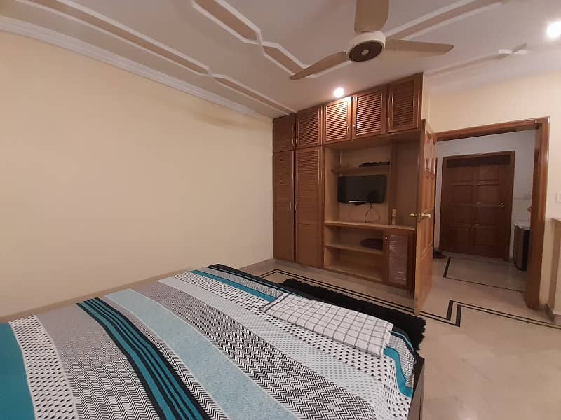 Fully furnished master bedroom with bath available for rent in dha phase 4. 12