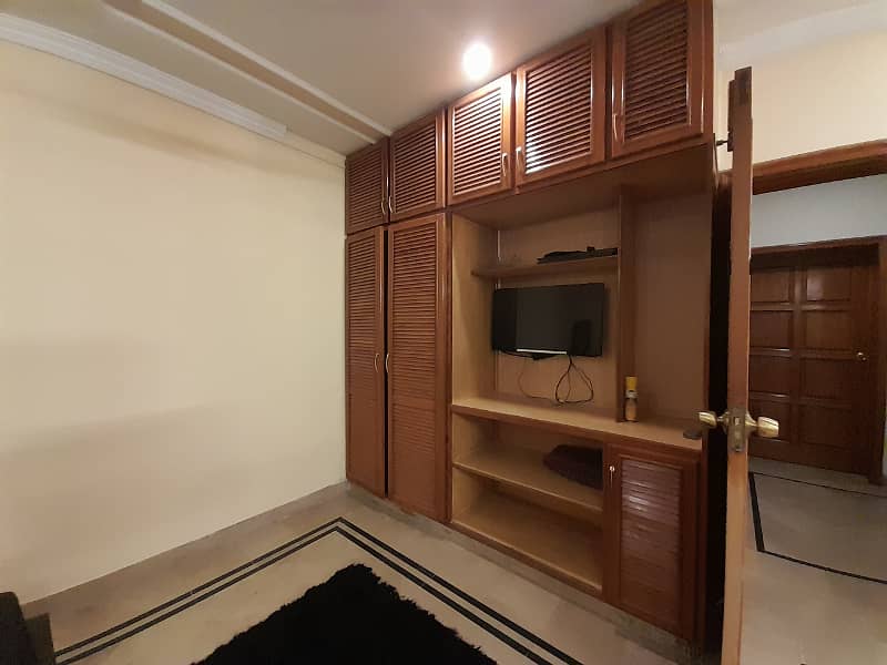 Fully furnished master bedroom with bath available for rent in dha phase 4. 13