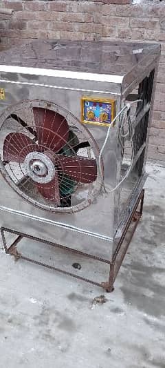 Steele ka large size ka air cooler with stand new condition .