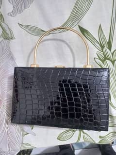 new black bag with chain