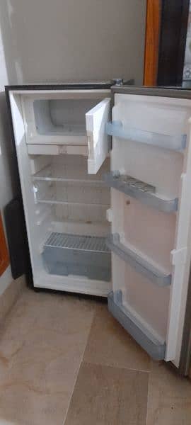 dawlance fridge new condition only 3 months use with stand 2
