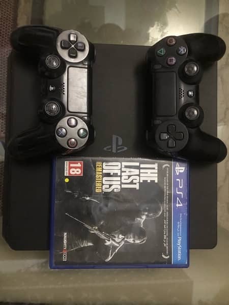 PS4 1TB with two controllers and one Game 2