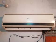 Haier ac split 1 ton red color good working