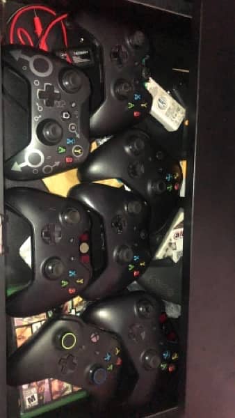 Xbox one x controllers and Game Cds 2