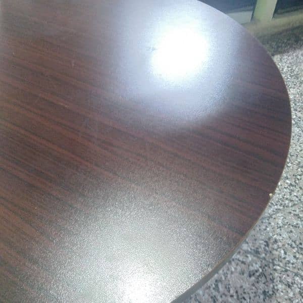 four men round dining table in immaculate condition. 3